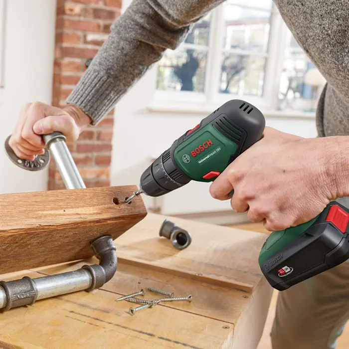 Bosch Cordless impact drill UniversalImpact 18V (green/black, 2x Li-ion battery 1.5Ah, case)