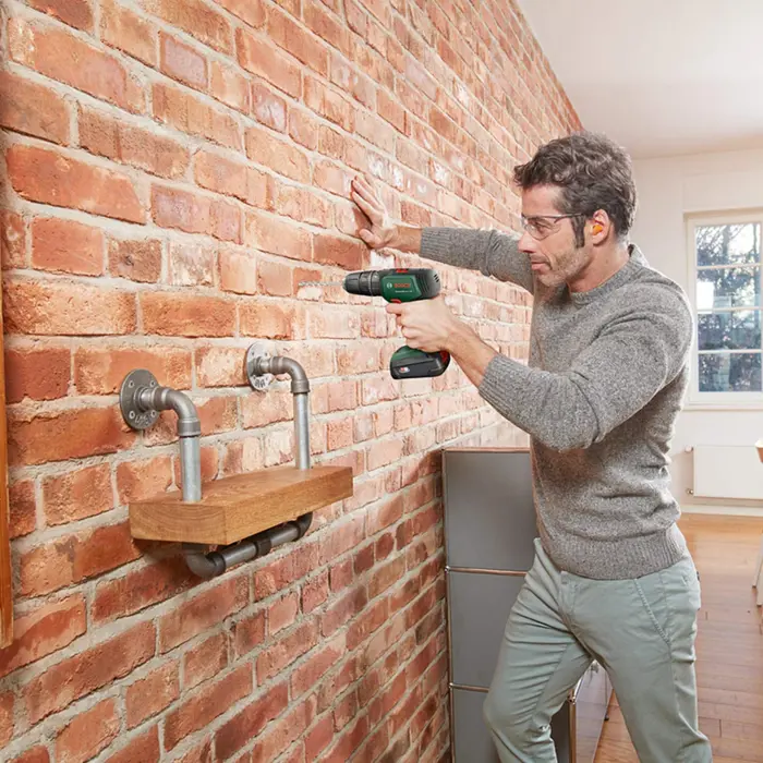 Bosch Cordless impact drill UniversalImpact 18V (green/black, 2x Li-ion battery 1.5Ah, case)